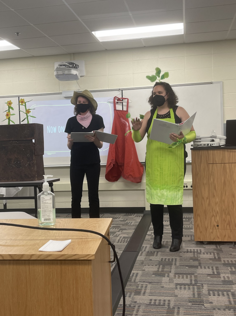 two presenters in costume