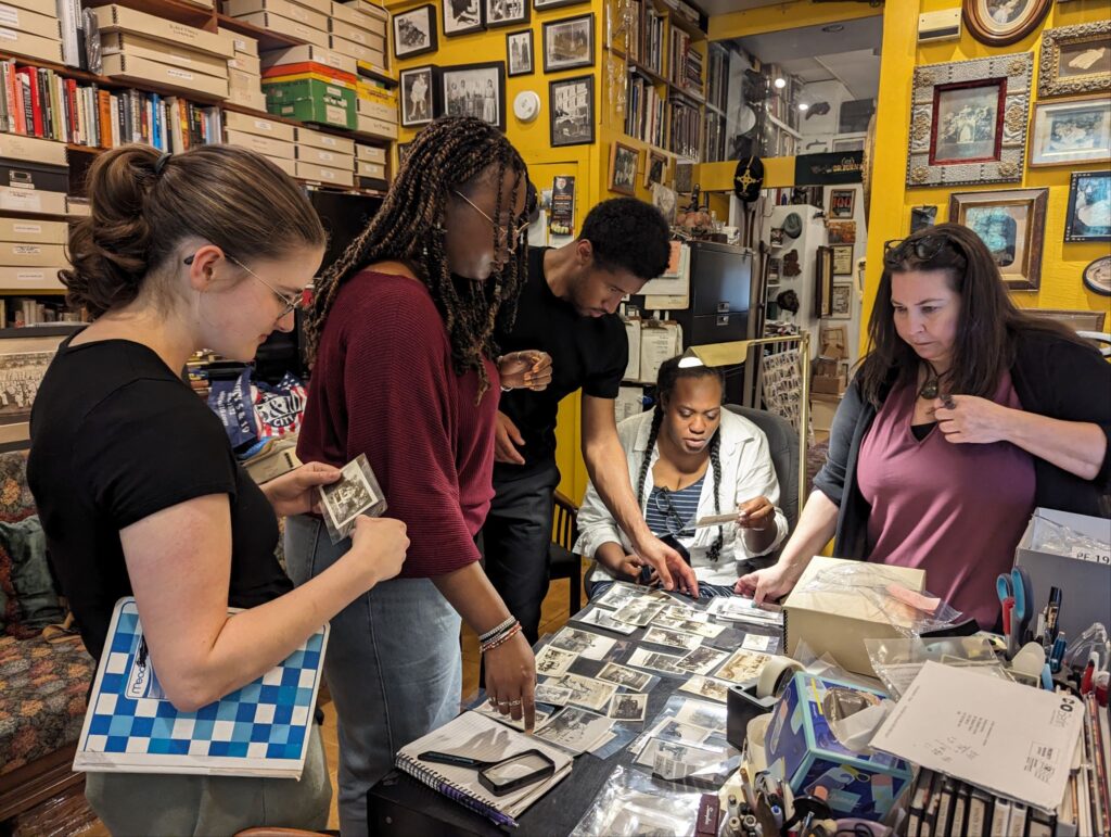 The project team and Dr. Liz Patton working in the Burns Archive in New York City