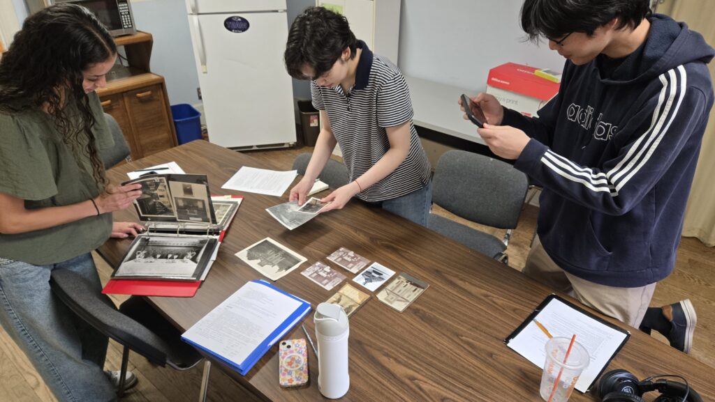 The project team examining church photos