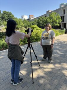 Project team members at work filming.
